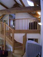 Oak staircase in Lounge leading to bedroom 1 Ty Gwenol